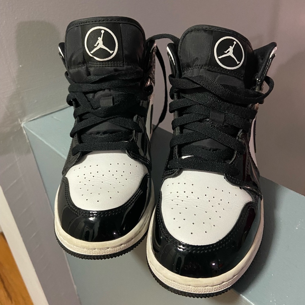 Nike Black and White High-Top Sneakers with Padded Collar